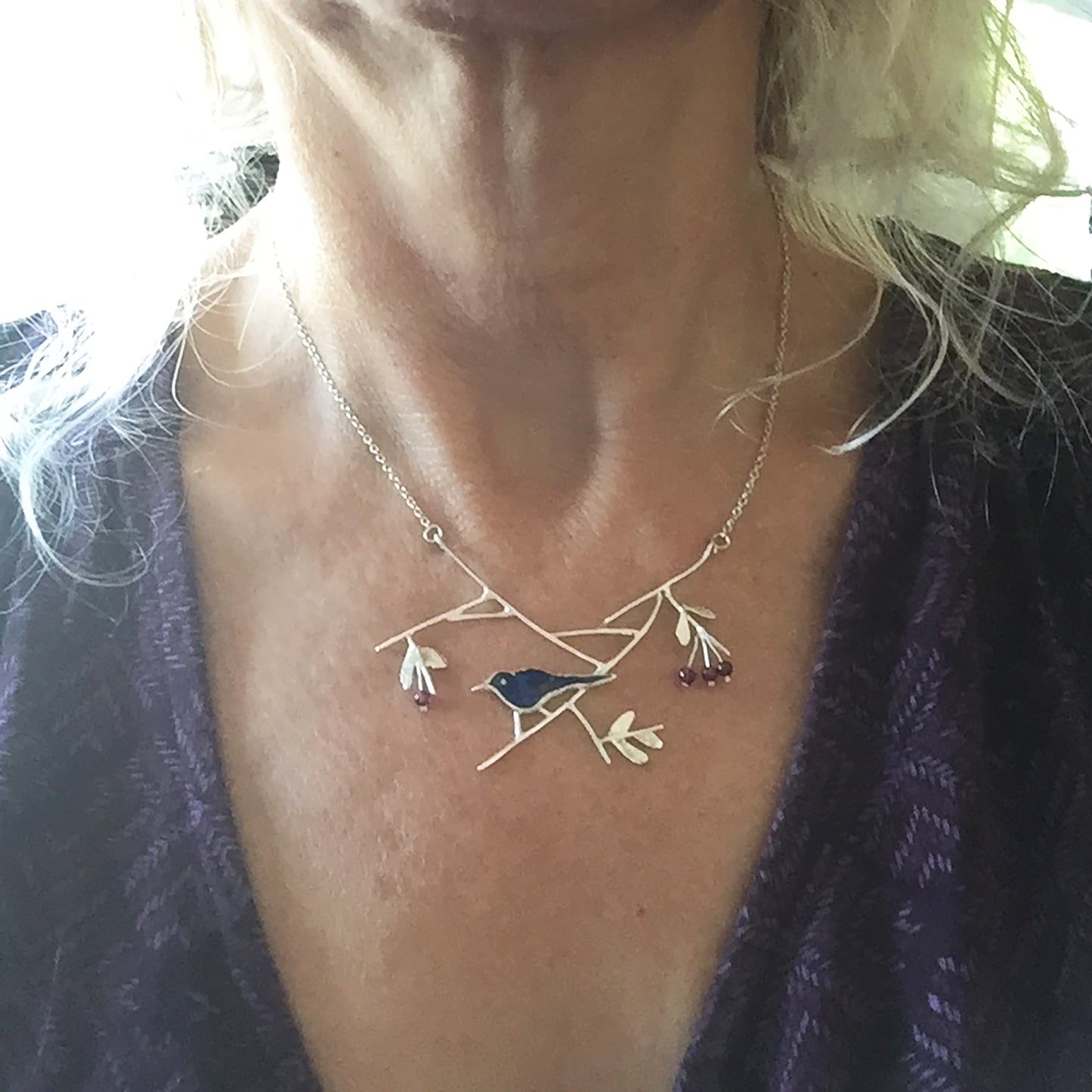 Blackbird with elderberries necklace