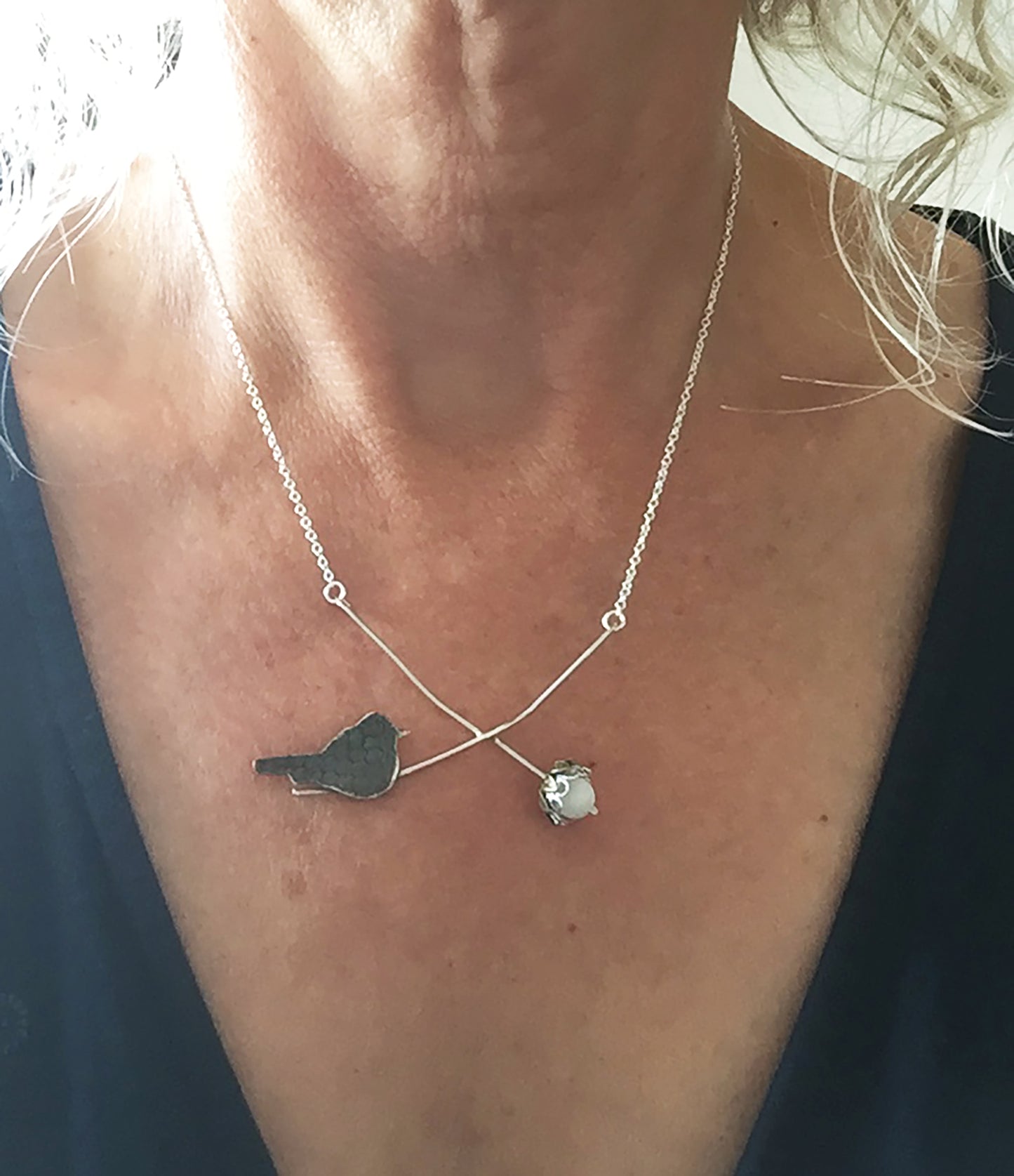 Blackcap with pearl berry necklace