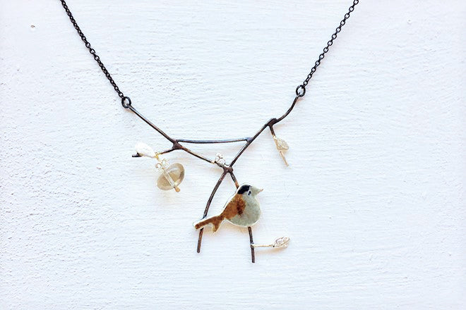 Blackcap with crab apple necklace