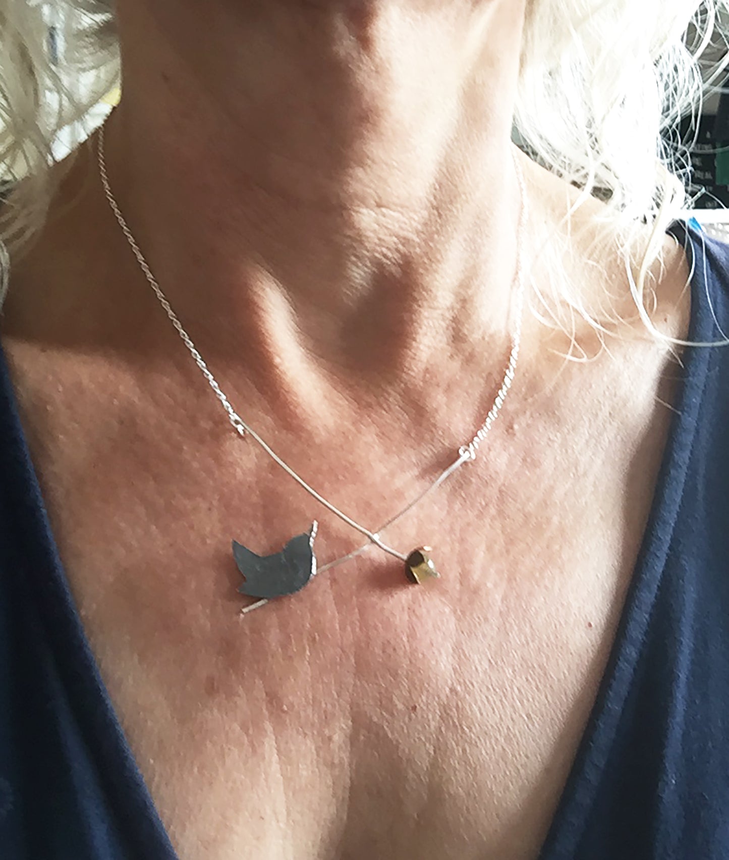 Wren with over ripe apple necklace