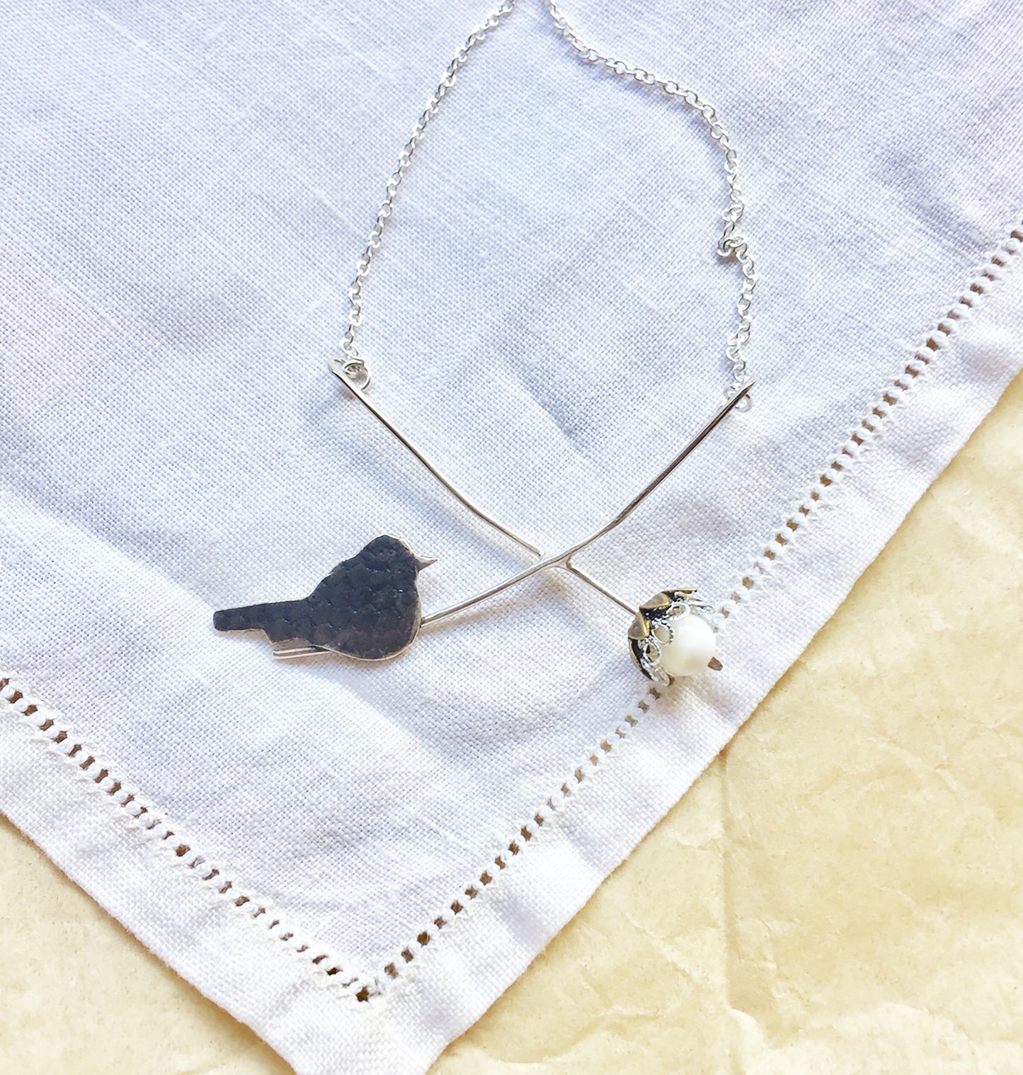 Blackcap with pearl berry necklace