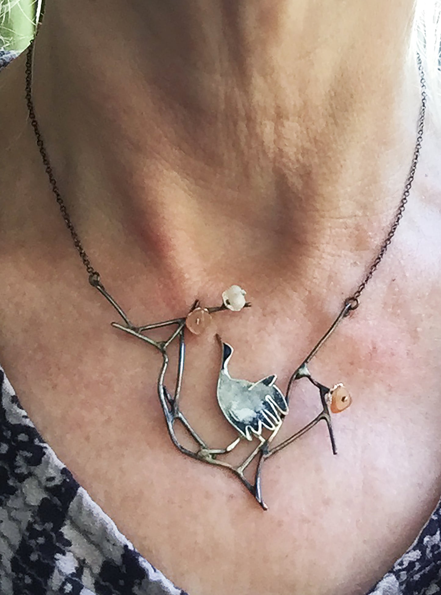 Crane with cherry blossom necklace