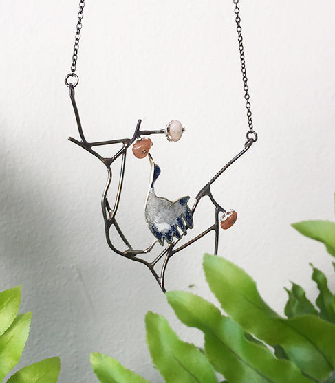 Crane with cherry blossom necklace