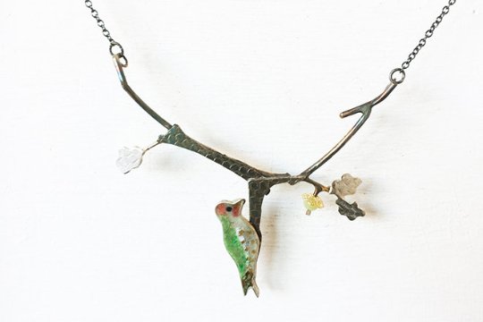 Woodpecker with acorn necklace