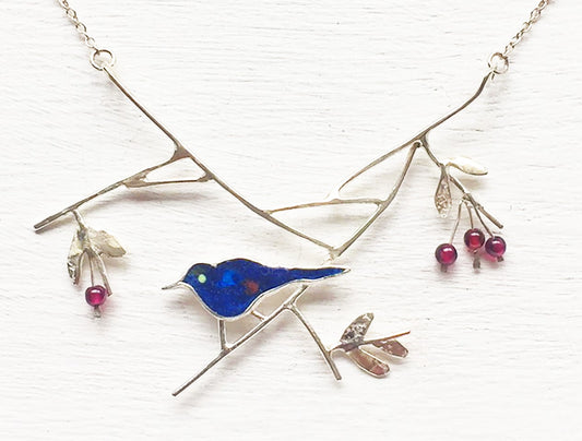 Blackbird with elderberries necklace
