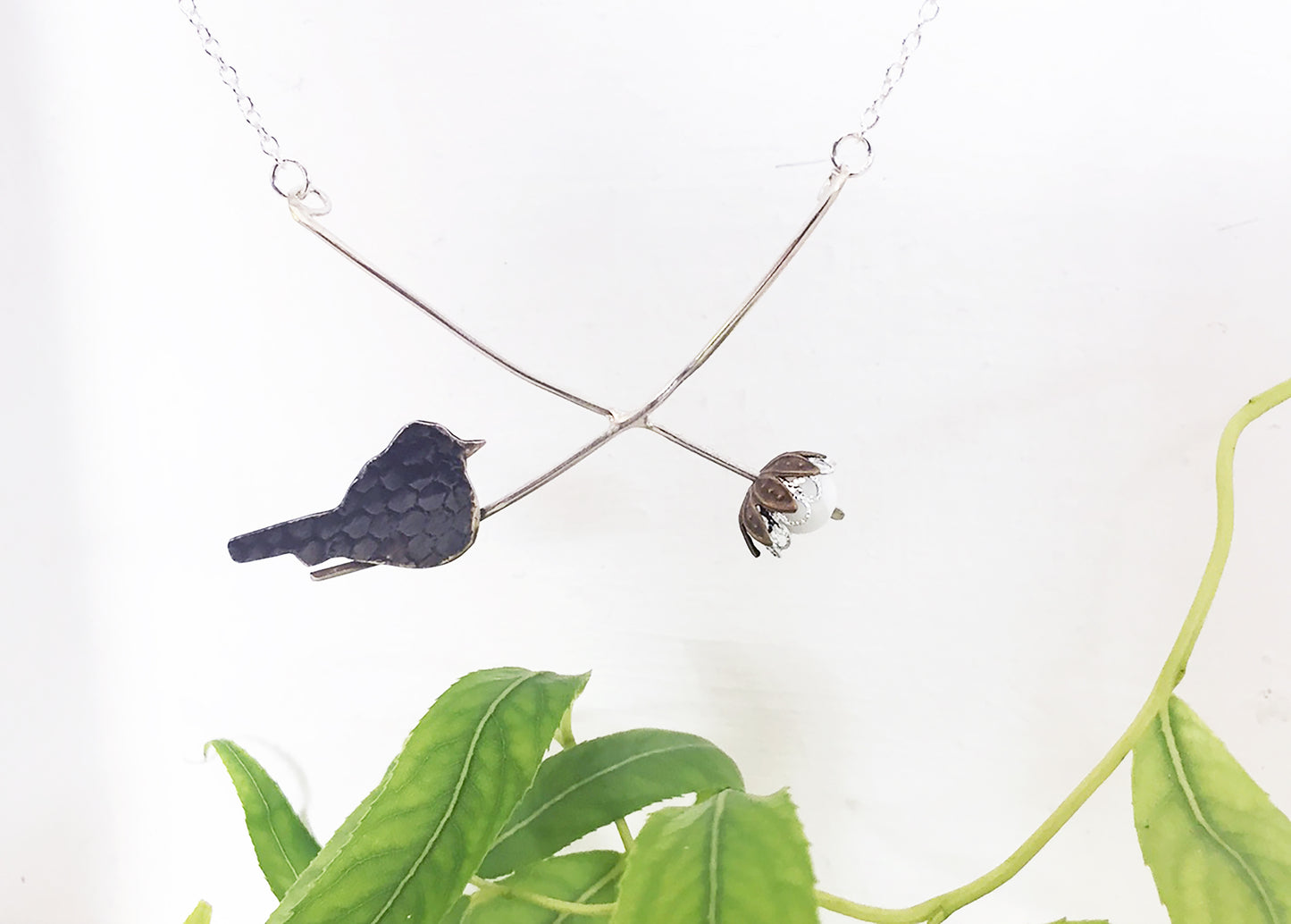 Blackcap with pearl berry necklace