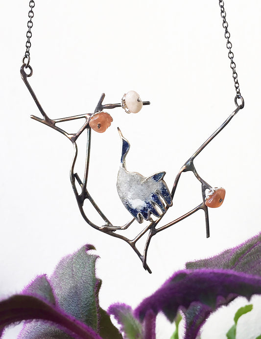Crane with cherry blossom necklace